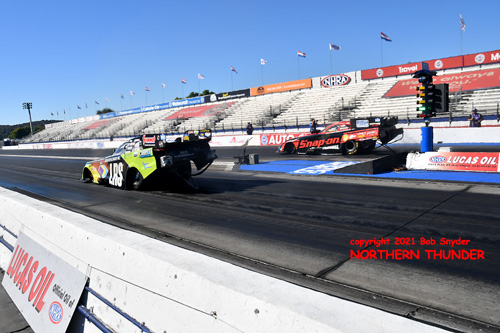 Tim Wilkerson (near lane) vs Cruz Pedregon 
(far lane)